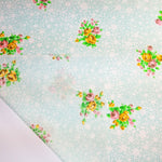 Load image into Gallery viewer, VINTAGE FABRIC BABY BOLT HALF-YARD -  SEVENTIES&#39; FLORAL BOUQUET ON WHITE WITH FLUFFY SEAFOAM FLOWER CLOUDS
