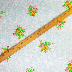 VINTAGE FABRIC BABY BOLT HALF-YARD -  SEVENTIES' FLORAL BOUQUET ON WHITE WITH FLUFFY SEAFOAM FLOWER CLOUDS